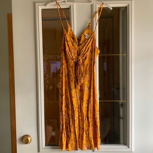 Mustard yellow floral thin strap dress with tie in front and zipper back